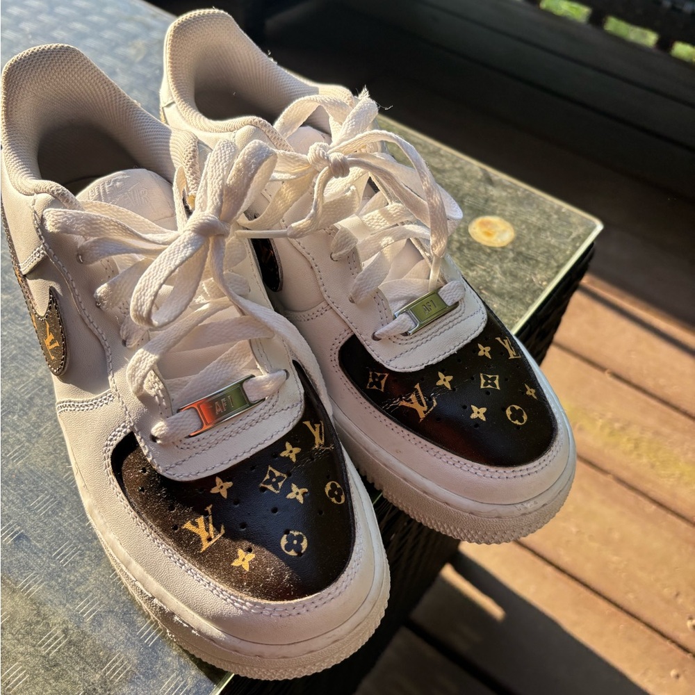 Nike Air Force 1 Customized White and Black Sneakers with Gold Accents